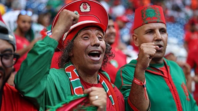 Morocco fans celebrate as the team advances to Round 16 of the World Cup