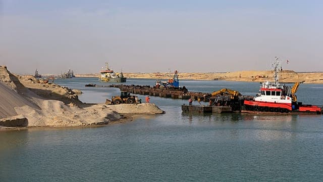 Major shipping carriers resume some sailings through Suez Canal