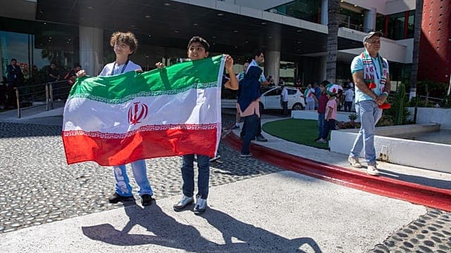 Fans cheer as Iran leave Mexico for Seattle ahead of final group game